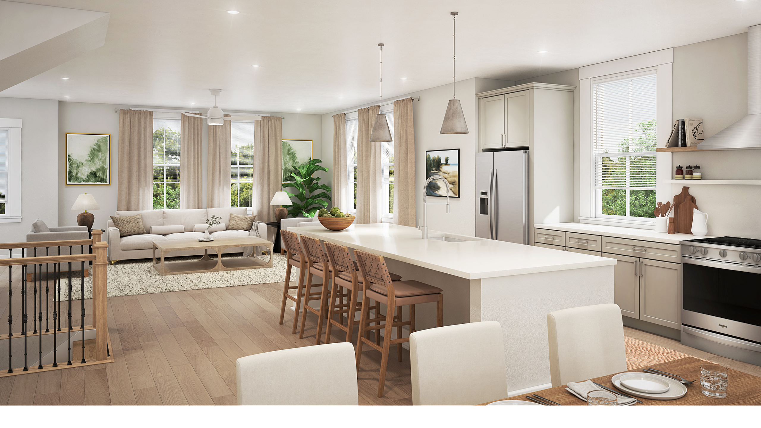 Bright open-concept living room and kitchen with modern furnishings and natural light.