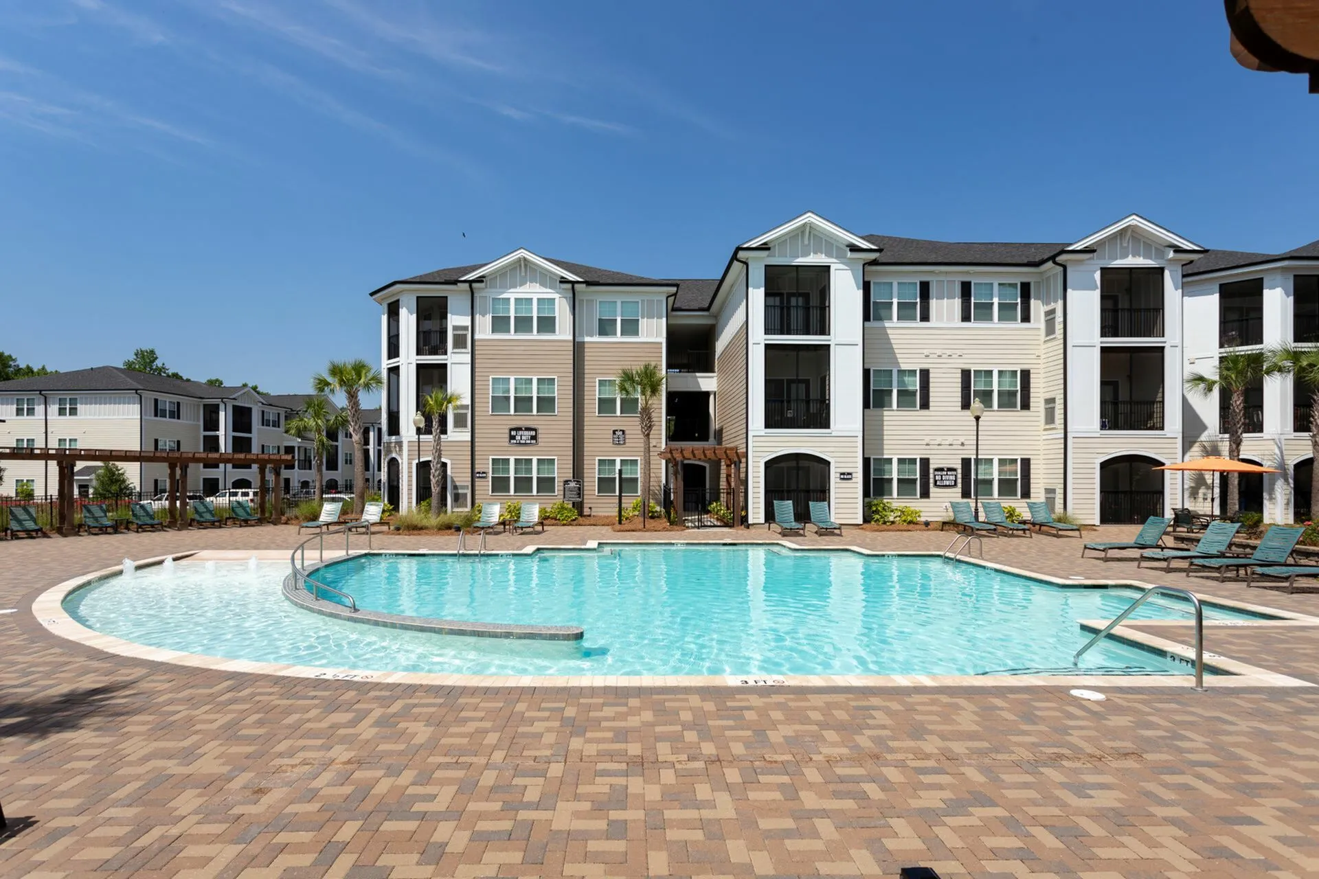 Relaxing Area by the Pool at Abberly Crossing Apartments in Ladson, SC