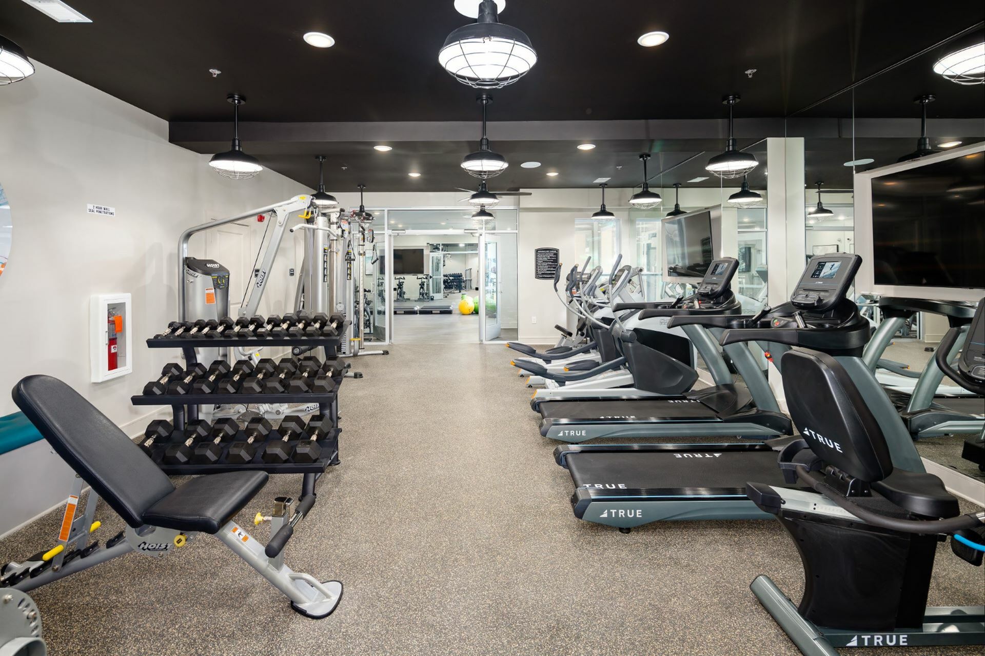 Stylized Fitness Studio with Fitness on Demand at at Abberly Solaire Apartments in Garner, NC