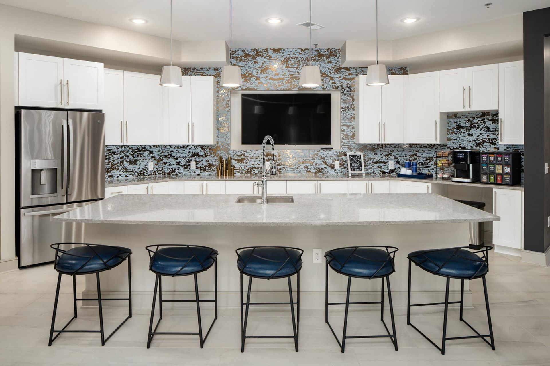 Clubhouse Kitchen Coffee Bar with Stools at Abberly Solaire Apartments in Garner, NC