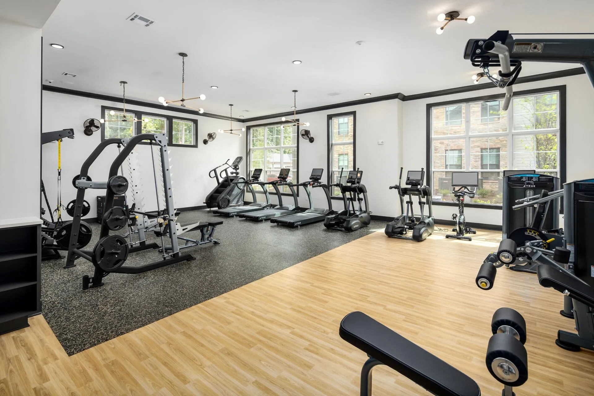 Fitness Center with Cardio and Weight Machines at Abberly Commons Apartments in Charlotte, NC