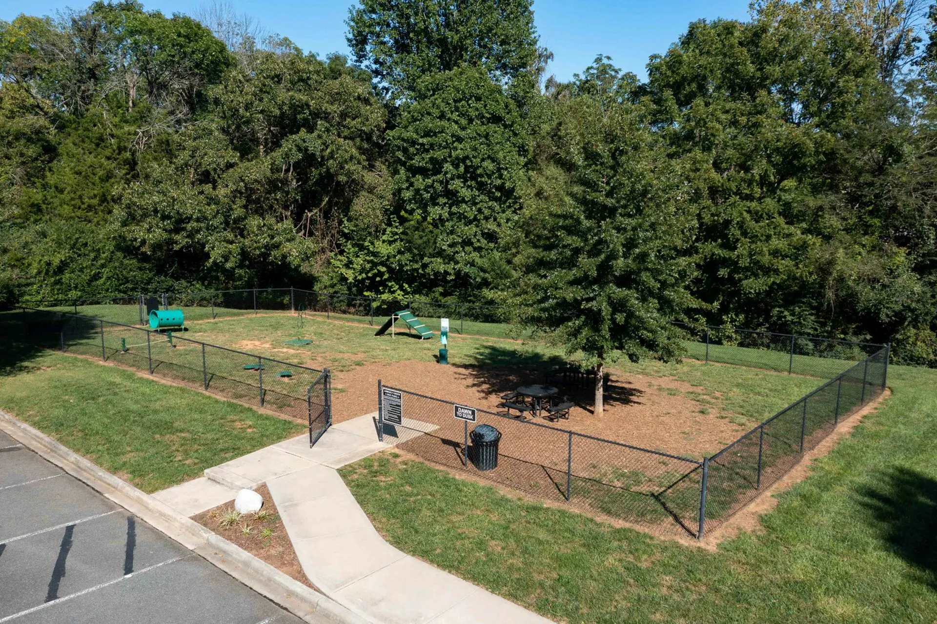 Dog Park with Agility Equipment at Abberly Green Apartments in Mooresville, NC