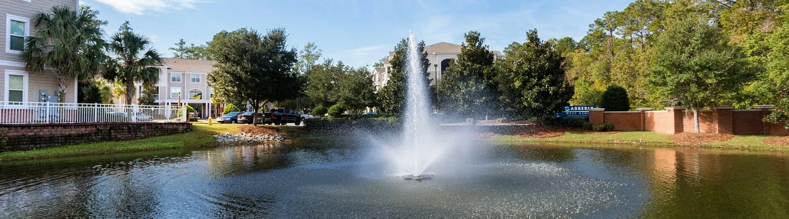 Pond with fountain at West Ashley Apartments in Charleston, SC