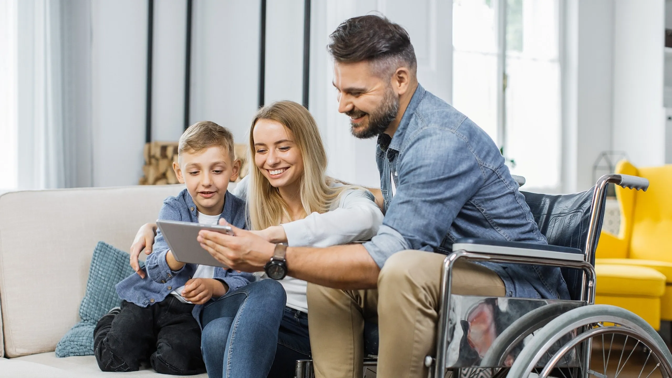 Happy family enjoying quality time together in a bright and welcoming living room, showcasing a cozy seating area and a cheerful atmosphere.