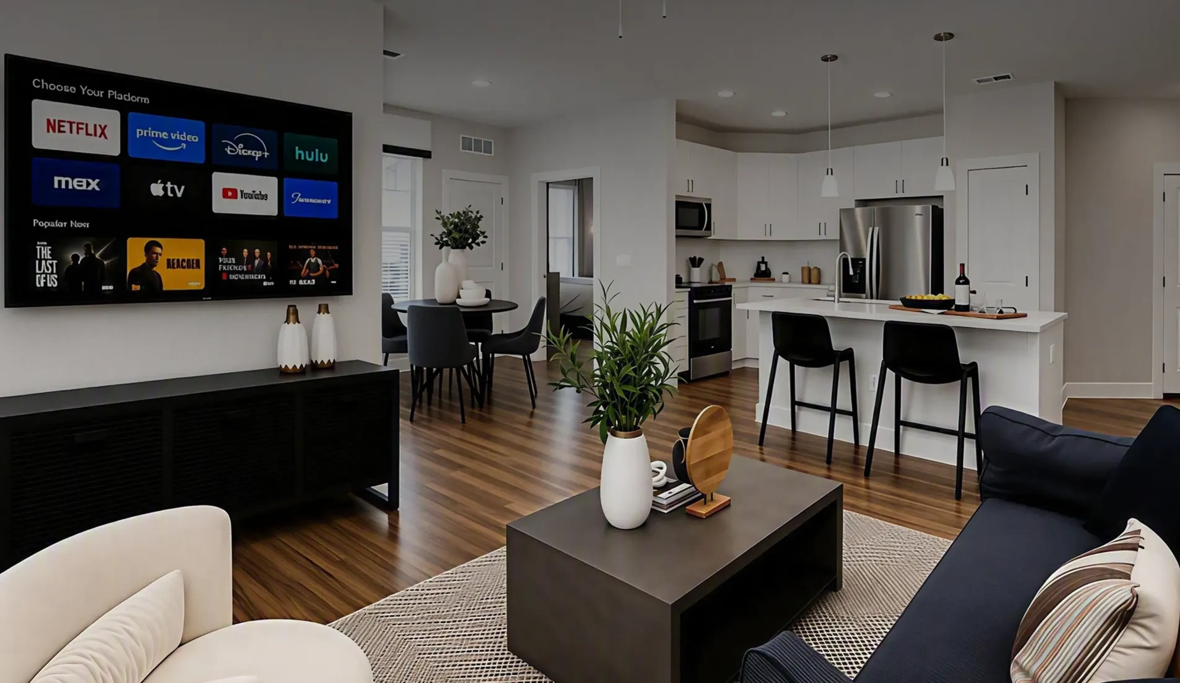 Open-concept living room and kitchen at Abberly Commons in Charlotte, NC.