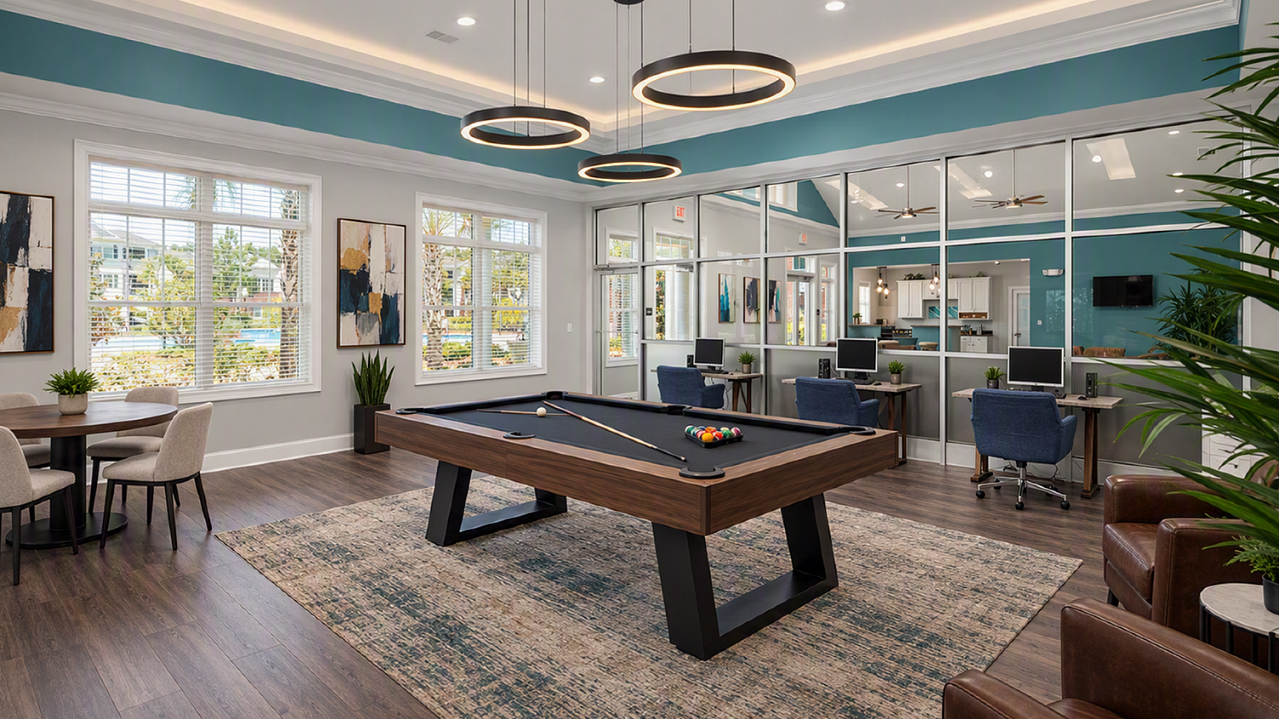 Luxurious recreation room with modern pool table, elegant seating, and stylish decor, ideal for social gatherings.
