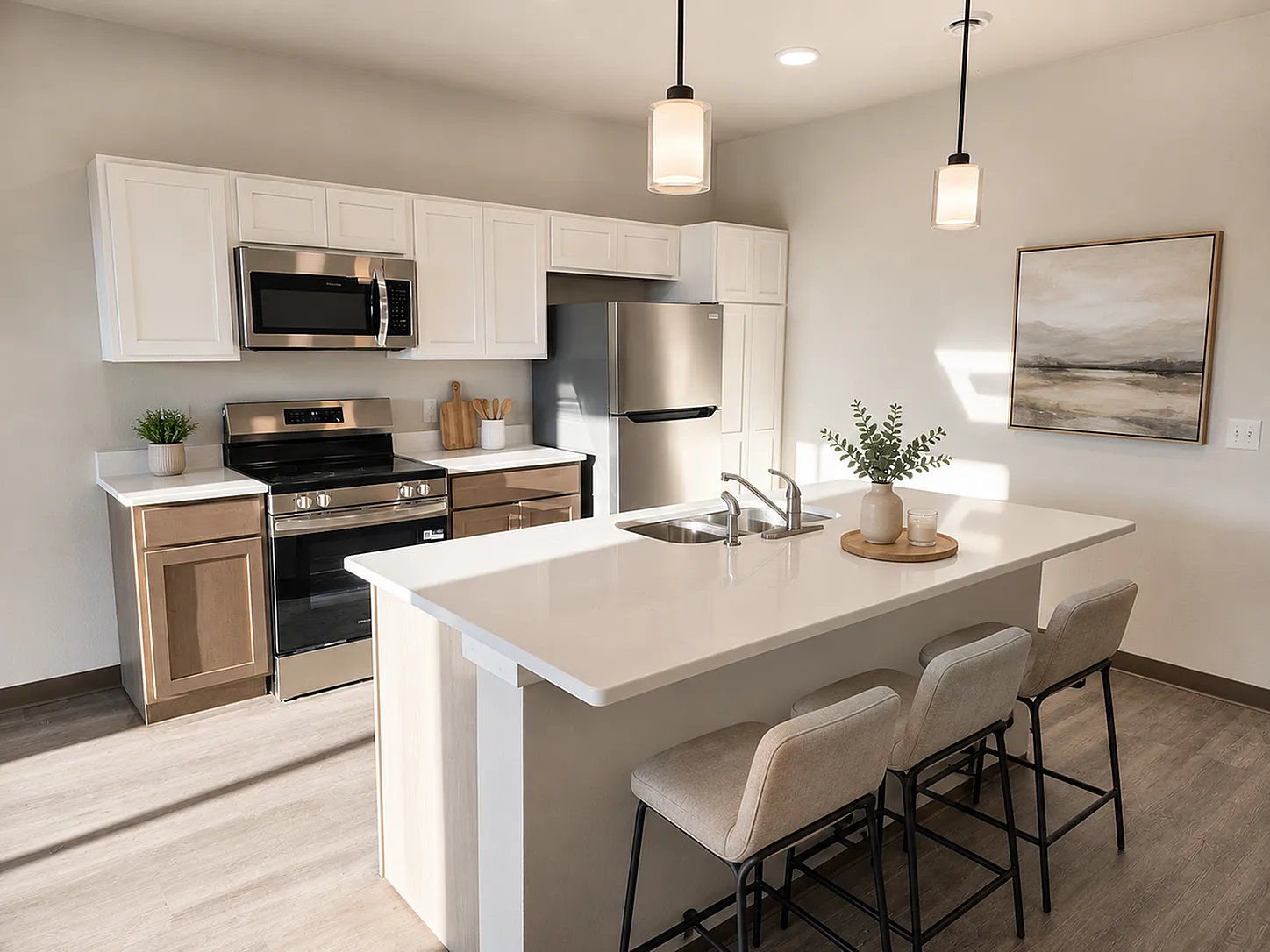 Contemporary kitchen with sleek stainless steel appliances, elegant white cabinetry, and a spacious island with modern pendant lighting.