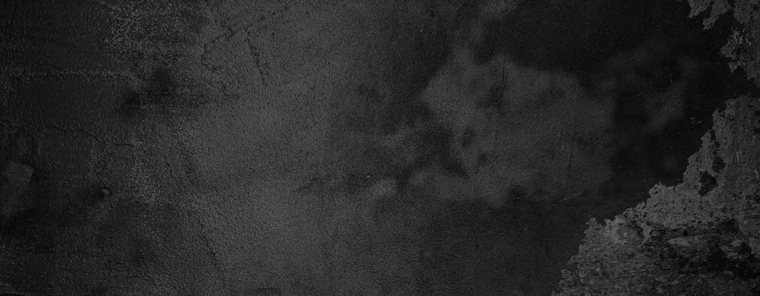 Elegant dark textured wall with artistic patterns, perfect for a modern and sophisticated ambiance.