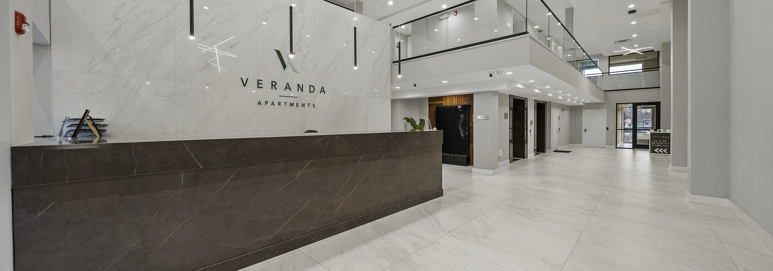 Elegant lobby of Veranda Apartments with modern design and spacious interiors.