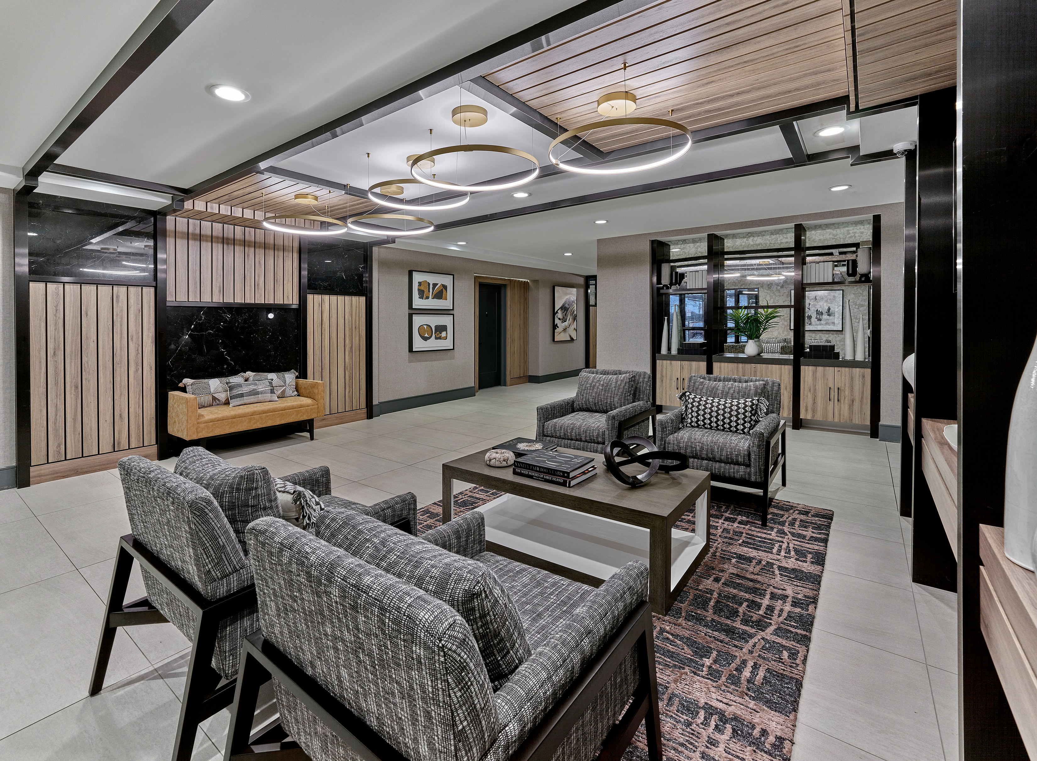 Luxurious lobby with modern design, featuring plush seating, elegant lighting, and stylish decor.