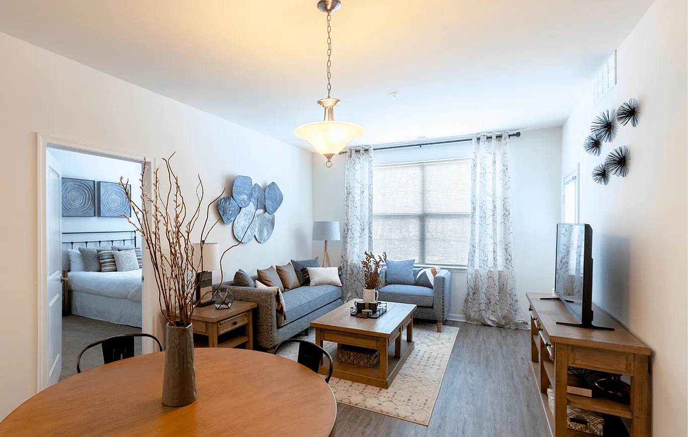 Chic and inviting living room with stylish decor, comfortable seating, and a warm ambiance, perfect for relaxation and social gatherings.