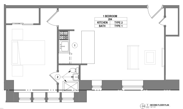 Modern second-floor plan showcasing a compact 1-bedroom layout with a Type 2 kitchen and Type 1 bath, featuring an open living space.