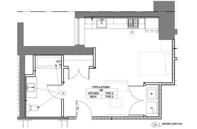 Modern studio floor plan featuring an efficient kitchen, spacious living area, and well-appointed bathroom on the ground floor.