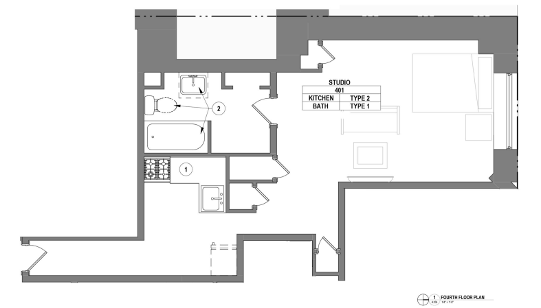 Modern studio apartment floor plan featuring an open living area, kitchen, and bathroom layout, ideal for efficient living.