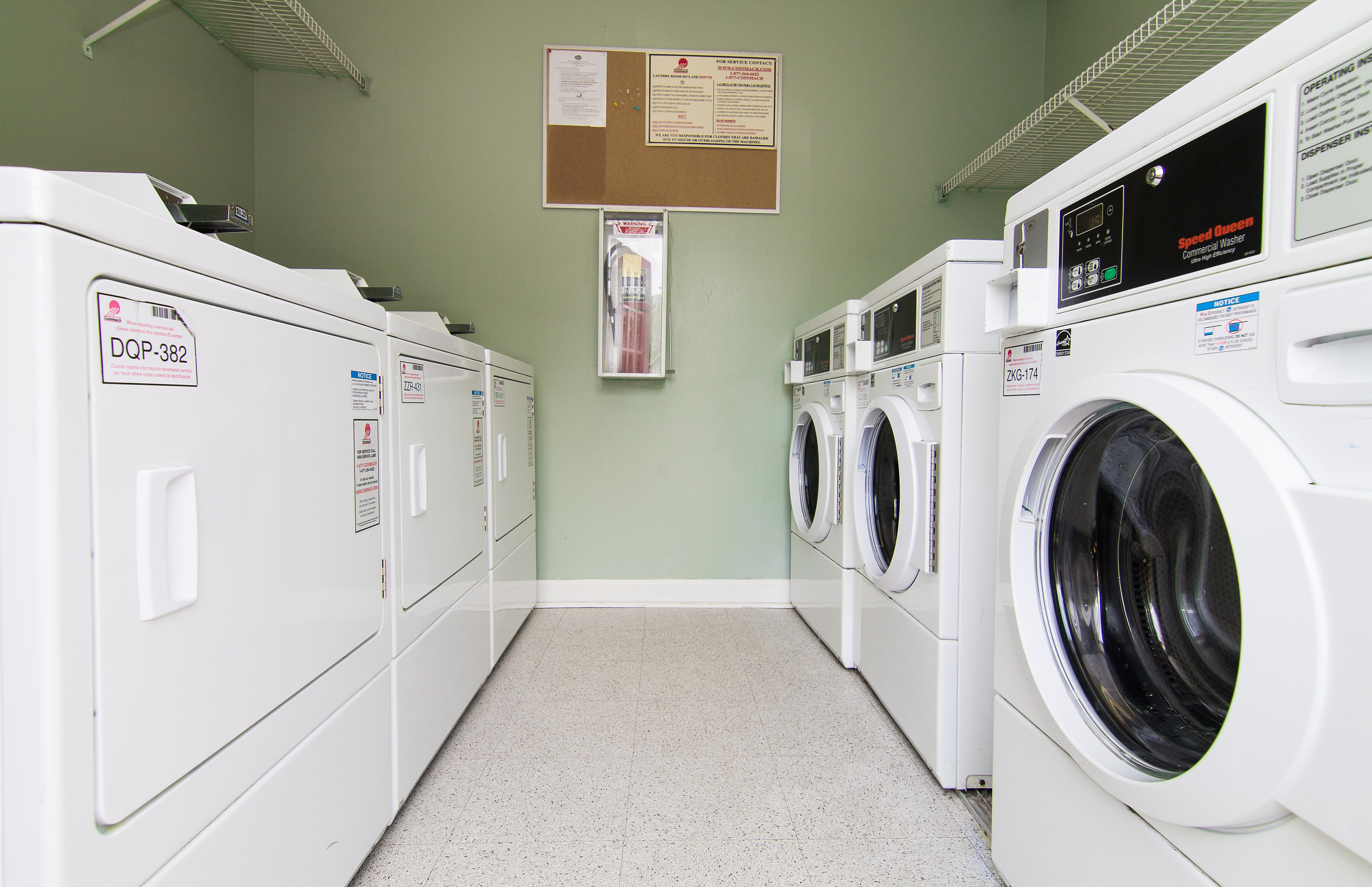 Modern laundry room equipped with efficient washers and dryers, perfect for convenient apartment living.