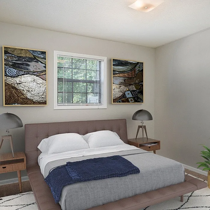 Elegant bedroom with modern decor, featuring a comfortable bed, chic lamps, and exquisite artwork, promising relaxation and style.