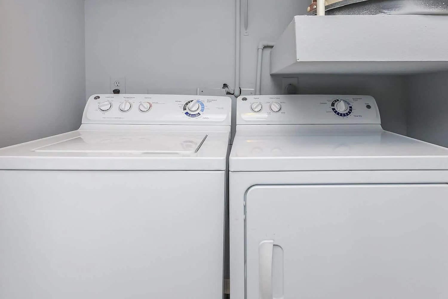 Contemporary laundry room with modern washer and dryer set, offering convenient in-home amenities.