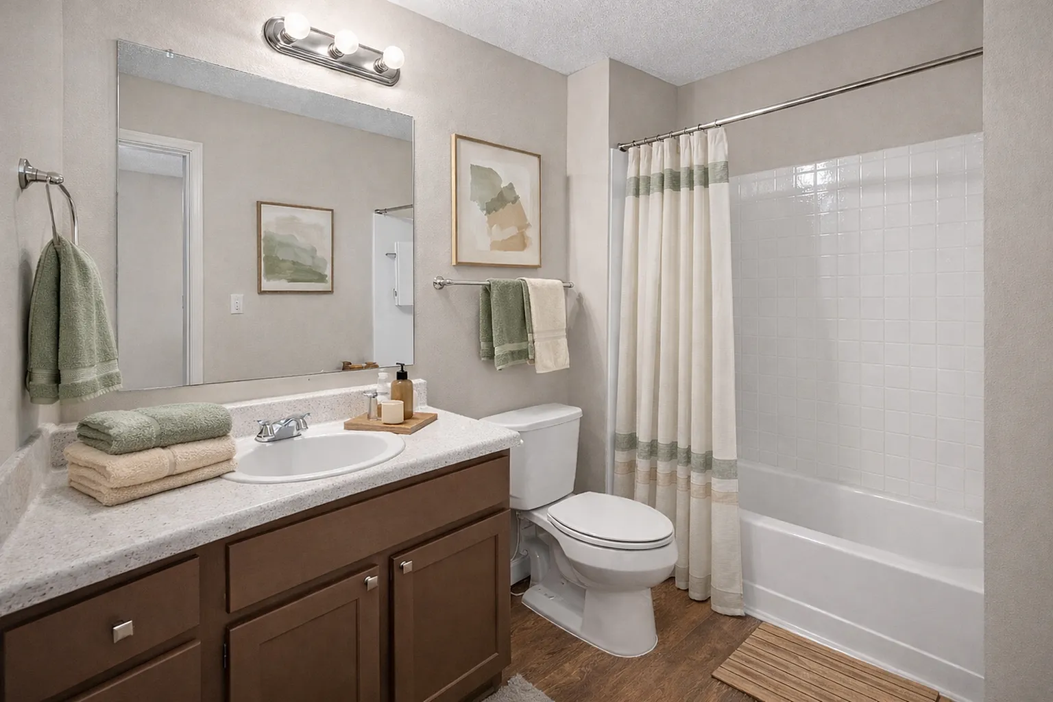 Elegant bathroom design with modern vanity, sleek countertop, and soft ambient lighting. Neutral tones and stylish decor create a serene retreat.