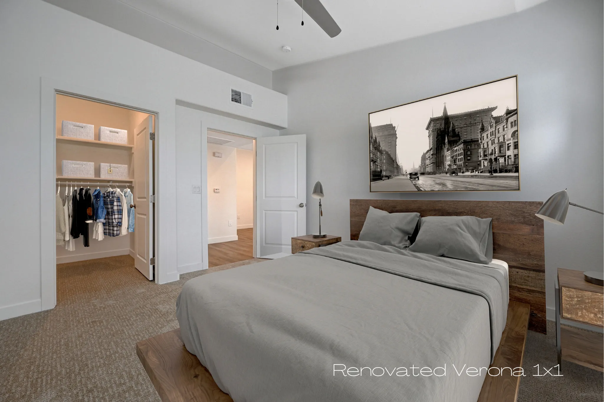 Inviting bedroom in the Renovated Verona 1x1, featuring a cozy bed, stylish decor, and a spacious walk-in closet with ample shelving.