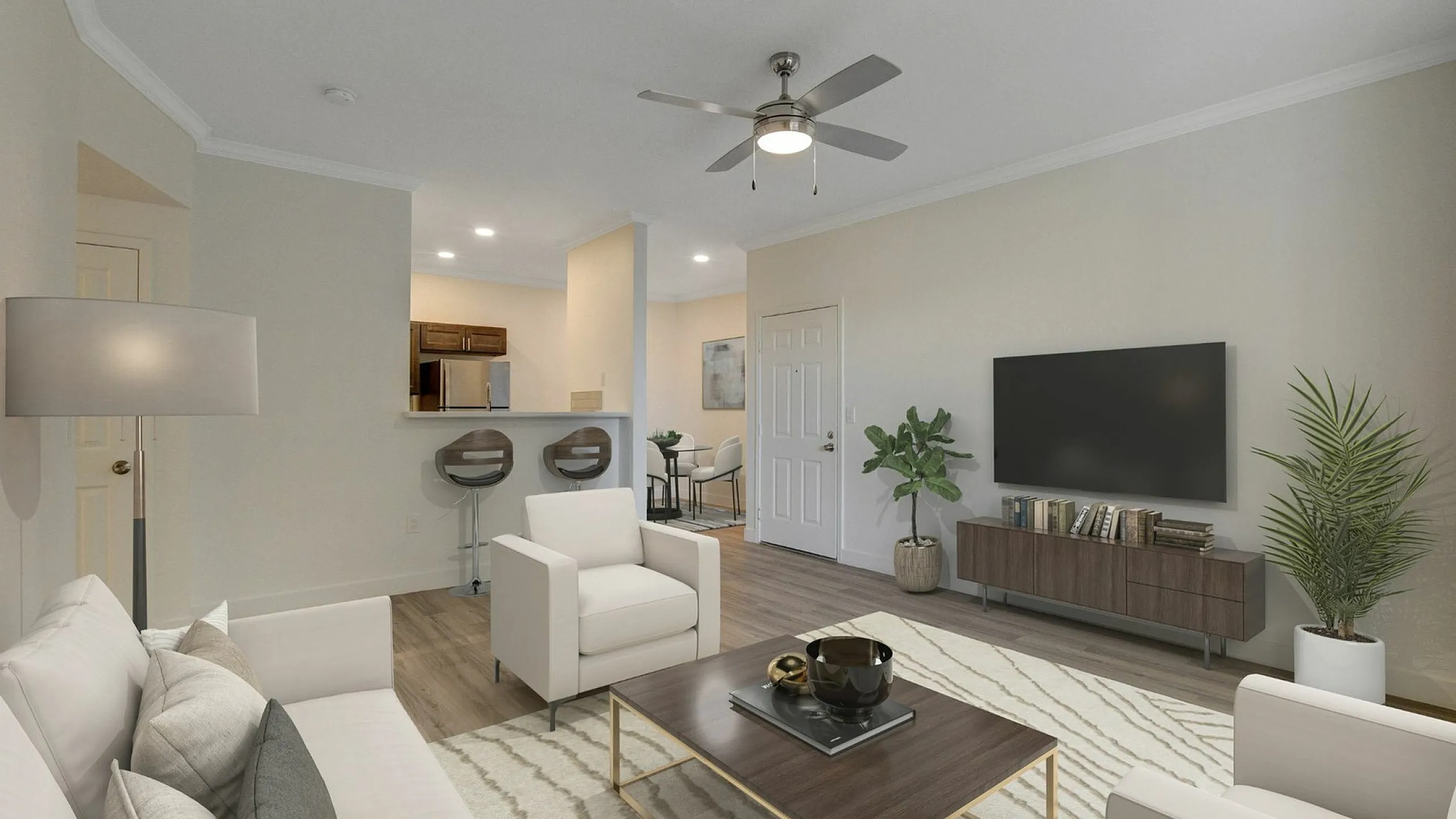 Contemporary living space featuring elegant furniture, a stylish open kitchen with a breakfast bar, and a sleek wall-mounted TV. Natural light illuminates the room, creating a warm and inviting atmosphere.