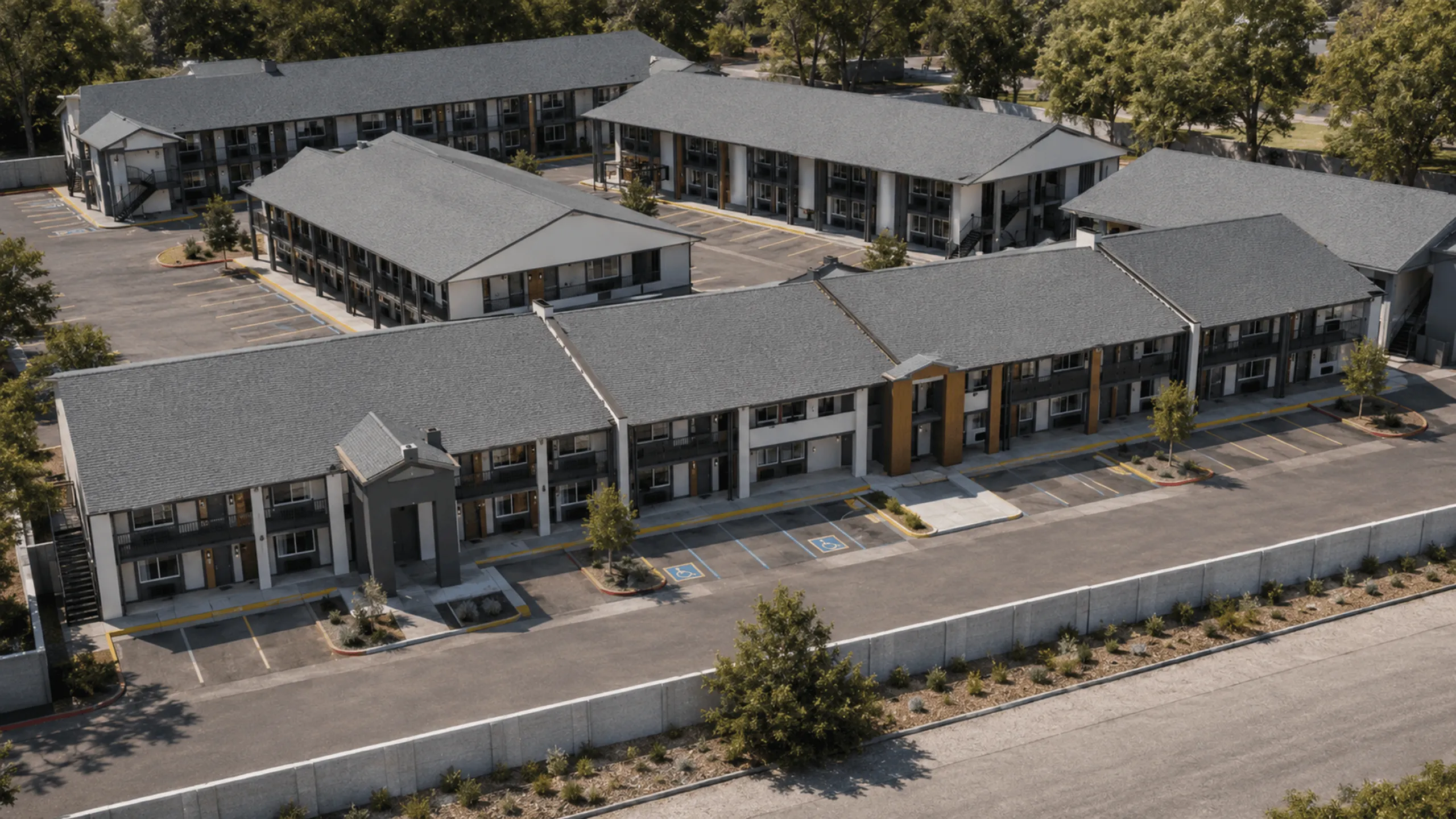 Charming modern apartment complex with spacious parking, surrounded by lush greenery and inviting architecture.