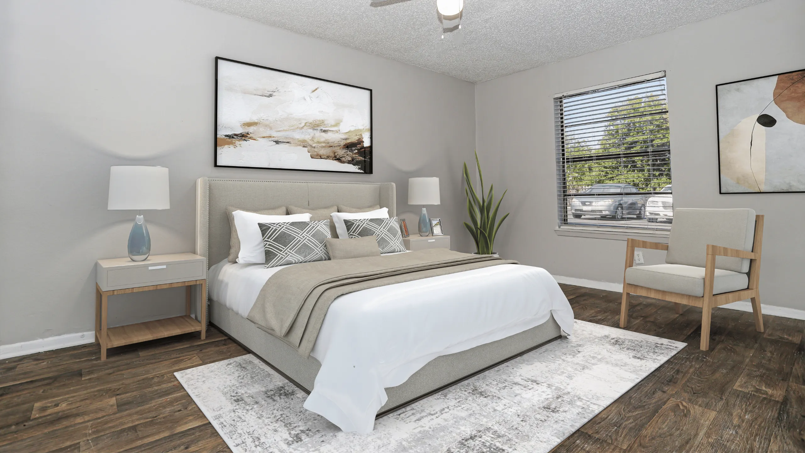 Elegant bedroom featuring a plush queen-sized bed with stylish pillows, sleek nightstands with modern lamps, and artistic decor. Natural light streams through a large window adorned with blinds, enhancing the serene ambiance.