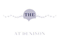 Elegant logo for The At Denison, featuring a sophisticated lavender color with decorative floral accents.