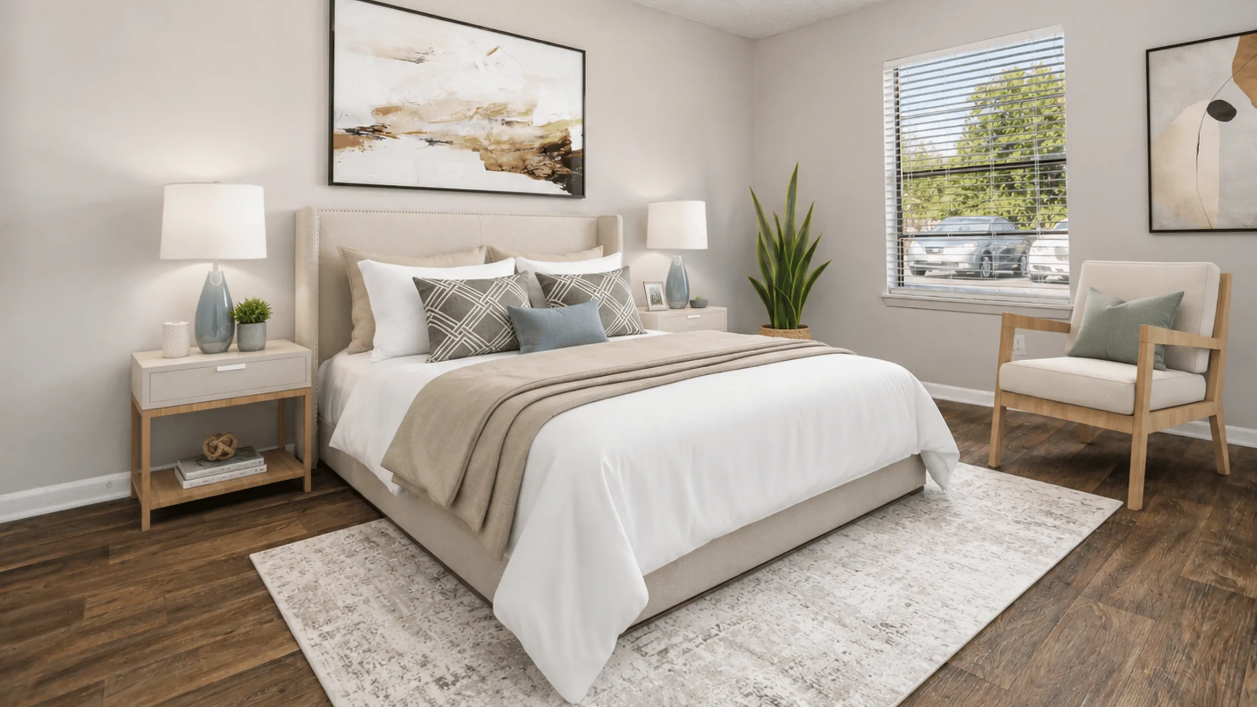 Inviting bedroom showcasing a cozy bed with plush pillows, elegant decor, and ample natural light filtering through large windows.