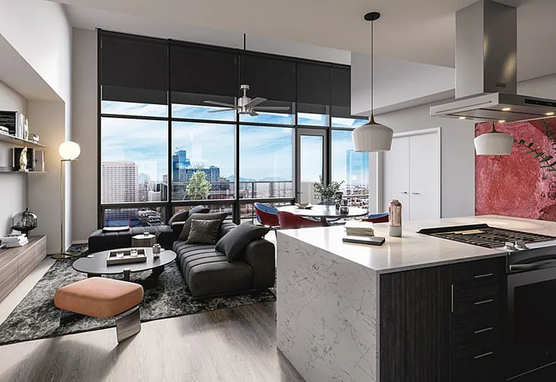 Modern apartment living room with floor-to-ceiling windows, city views, sleek kitchen island, and stylish decor.