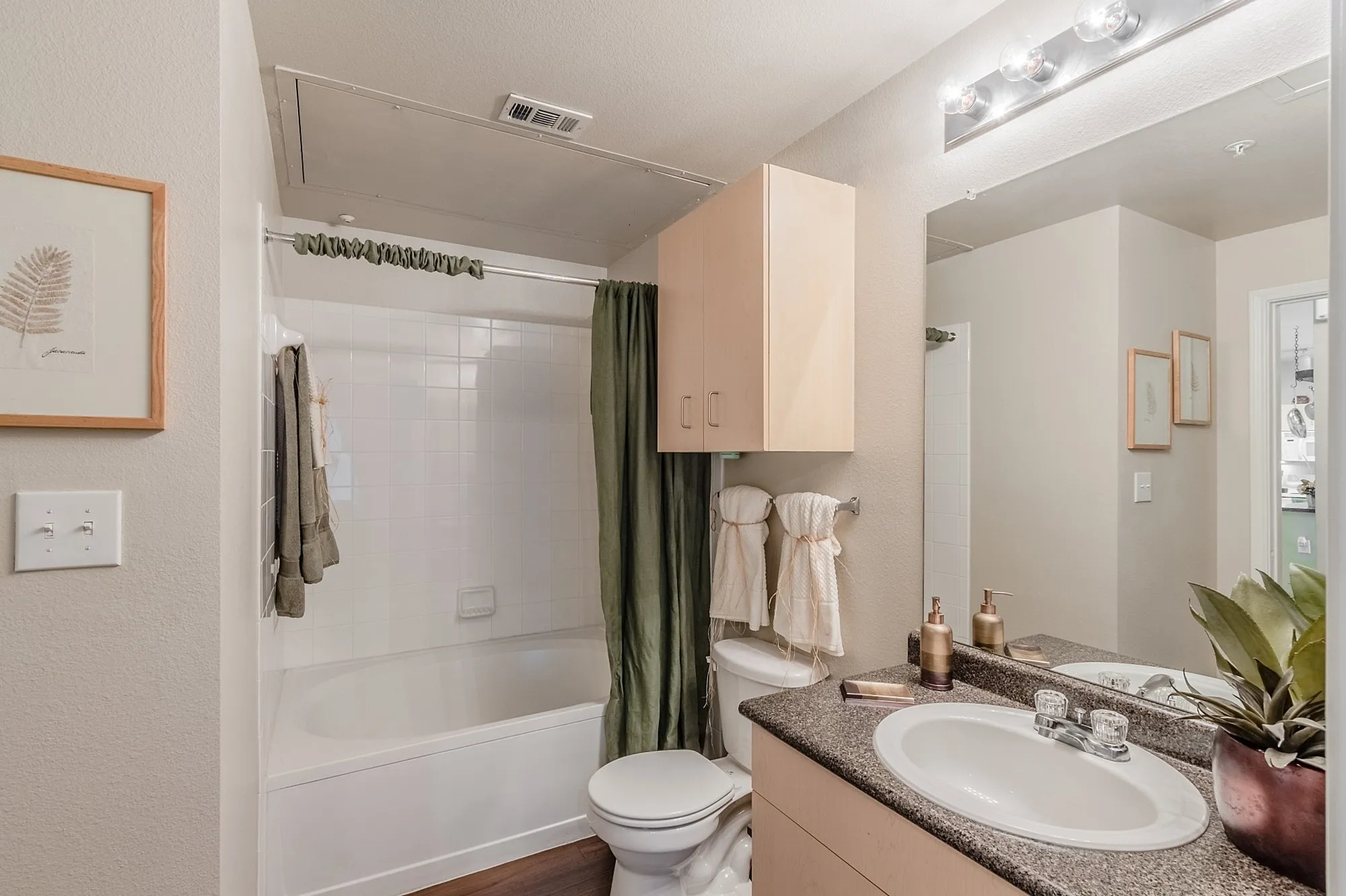 Modern bathroom with elegant fixtures, a relaxing bathtub, and stylish decor, perfect for a tranquil retreat.