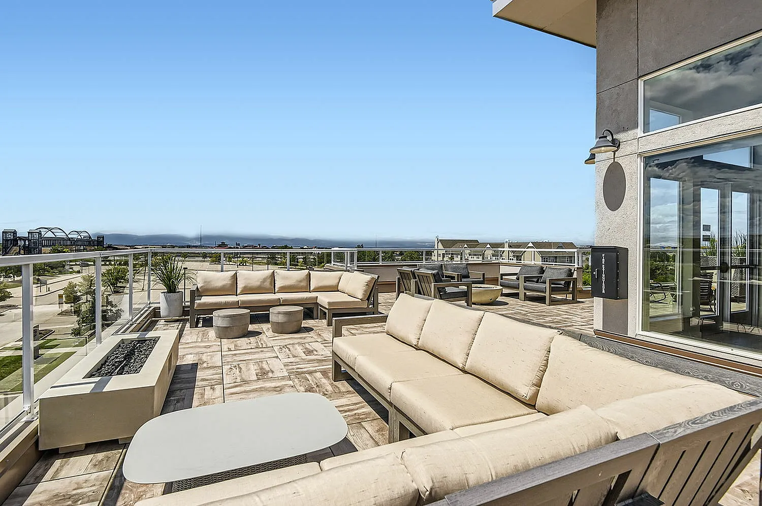 Exceptional rooftop terrace showcasing luxurious outdoor seating with breathtaking city views and modern amenities.