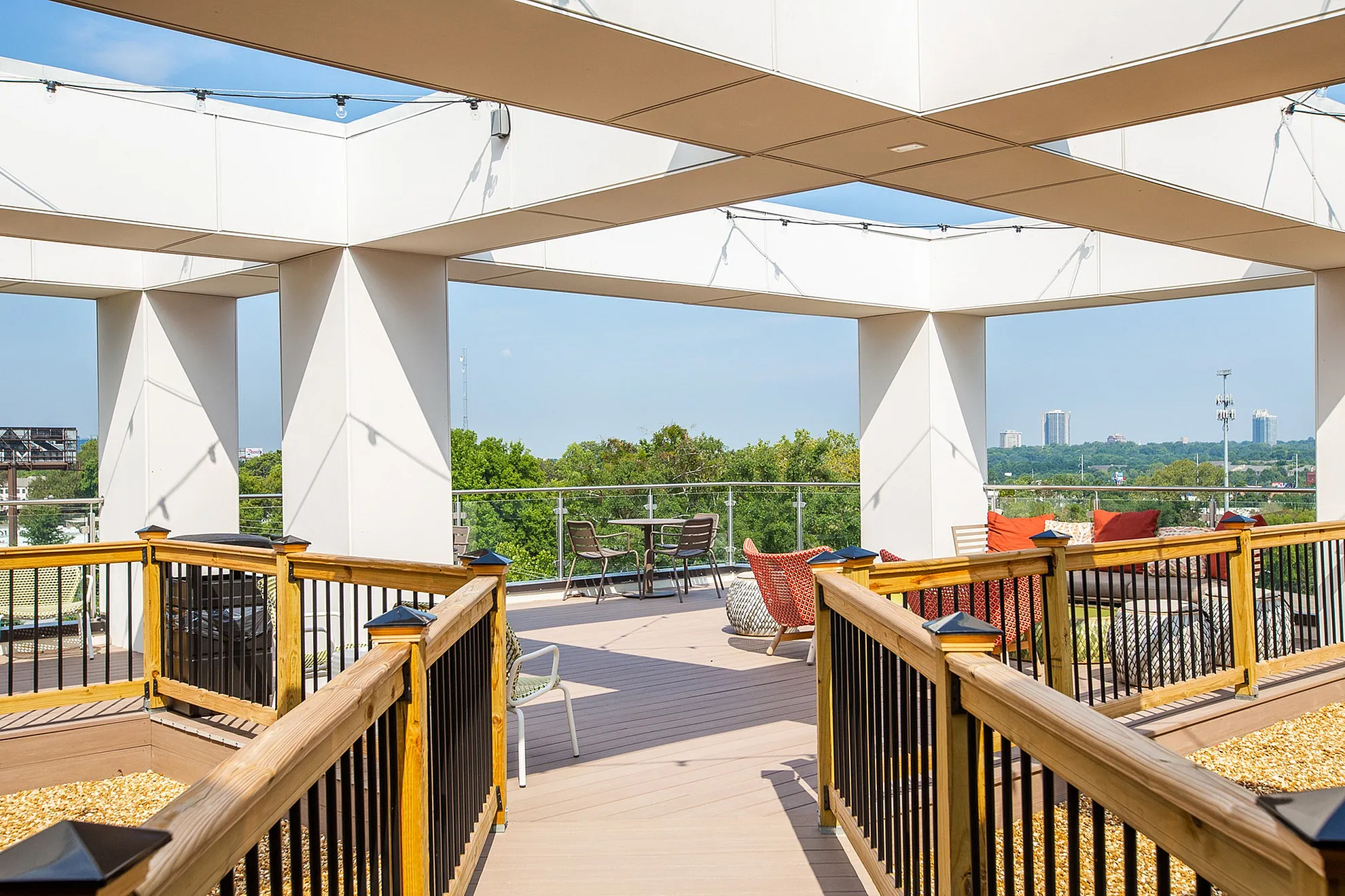 Enchanting rooftop terrace with stylish seating, expansive views, and modern architectural design, perfect for relaxation and entertaining.