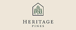Elegant logo for Heritage Pines featuring stylized pine trees within a house outline, set against a clean background.