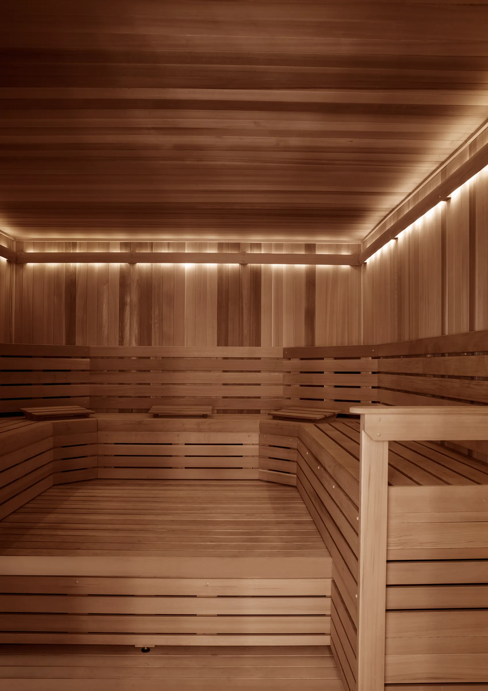 Luxurious wooden sauna interior with warm ambient lighting, offering a relaxing and rejuvenating retreat.
