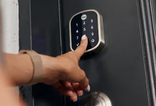 Modern smart lock with illuminated keypad enhancing home security and convenience.