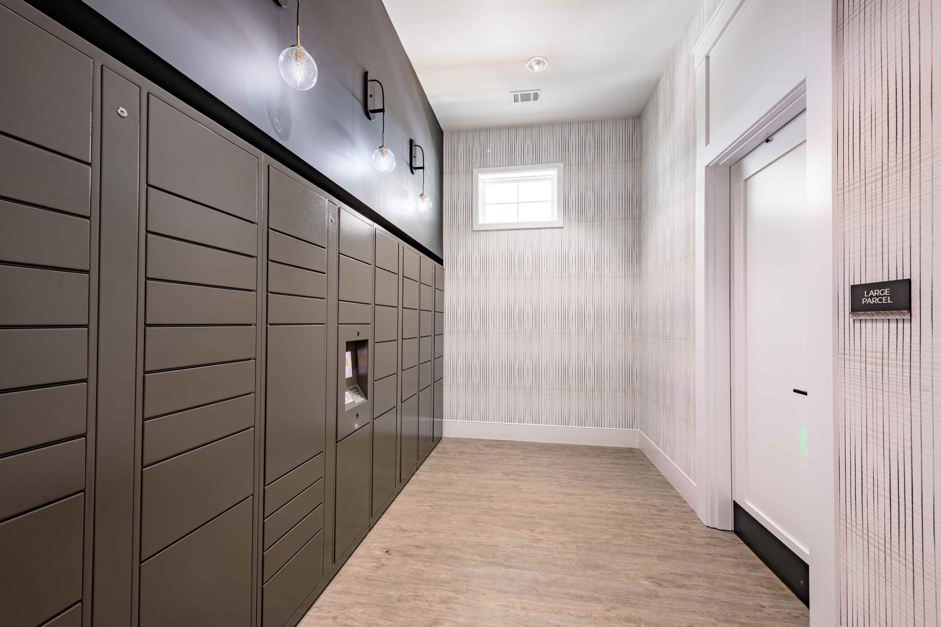 Contemporary package locker area with sleek lines and modern lighting, perfect for seamless delivery management.