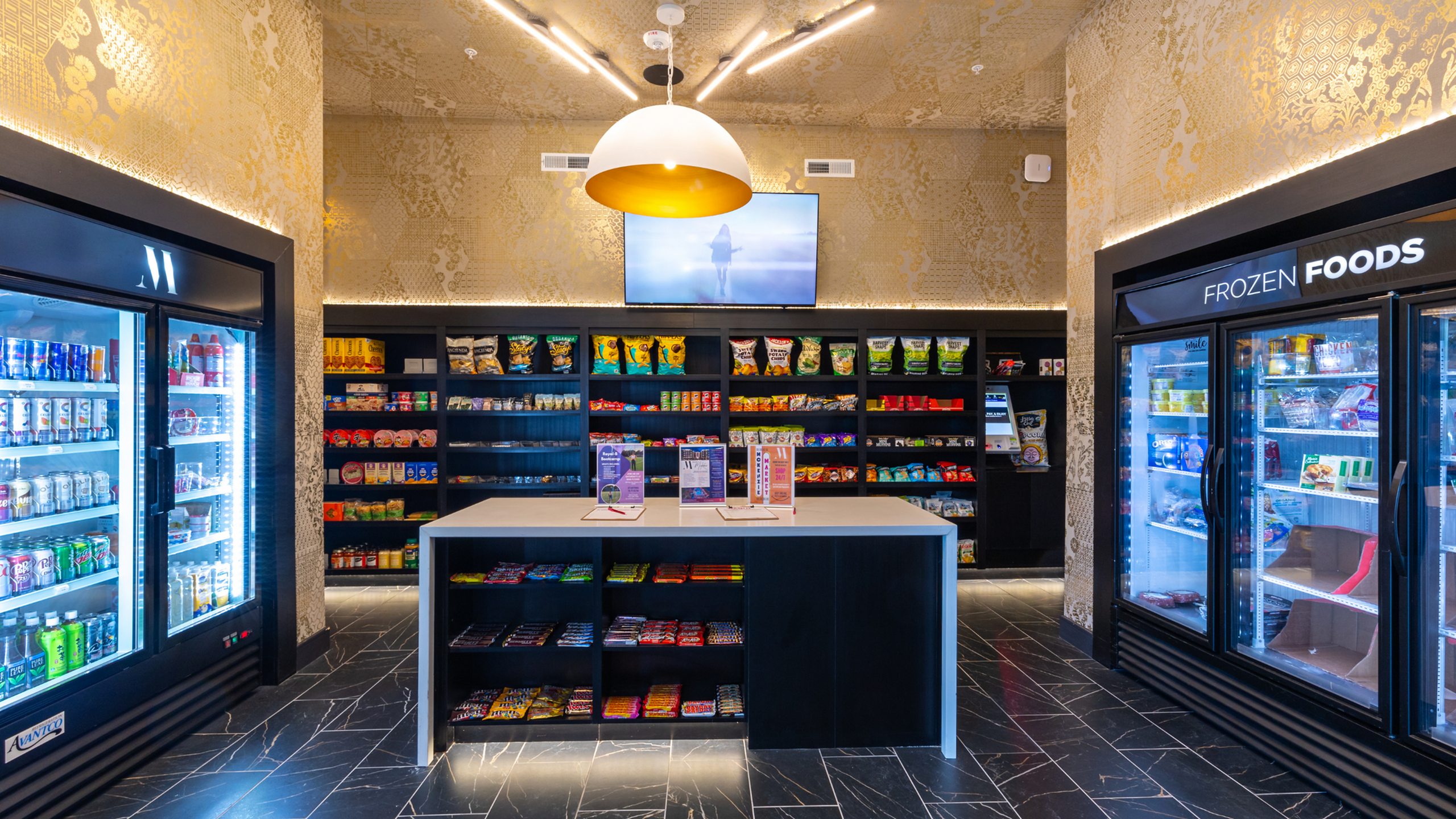 Modern convenience store with well-stocked shelves, a variety of snacks, and chilled beverages in a stylish, well-lit setting.