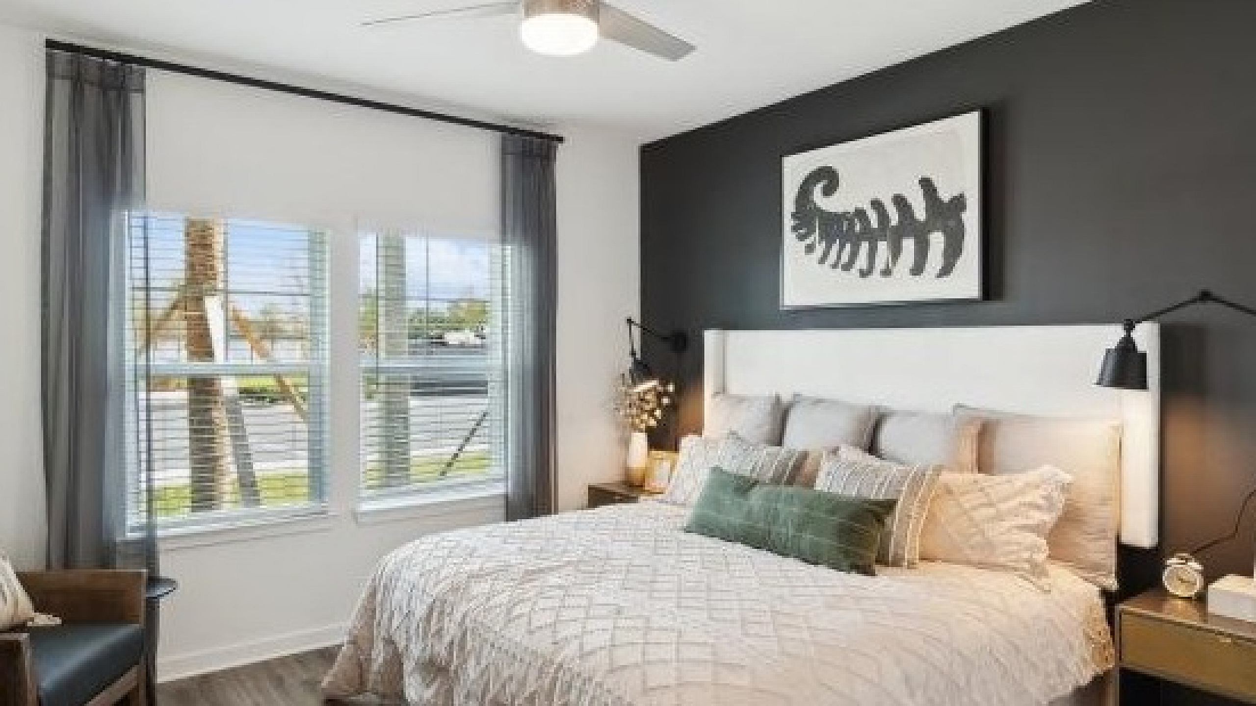 Elegant bedroom featuring a cozy king-size bed, modern decor, and large window with natural light, set against a sleek dark accent wall.