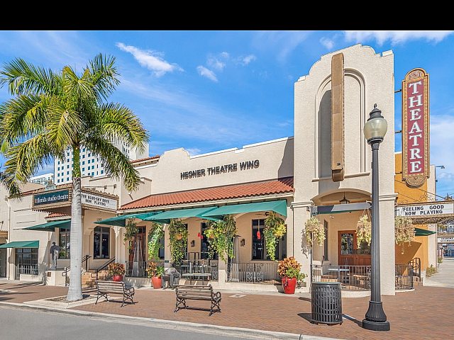 Theatre Exterior with Palm Trees