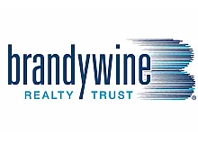 Logo of Brandywine Realty Trust with sleek blue typography and dynamic horizontal lines.