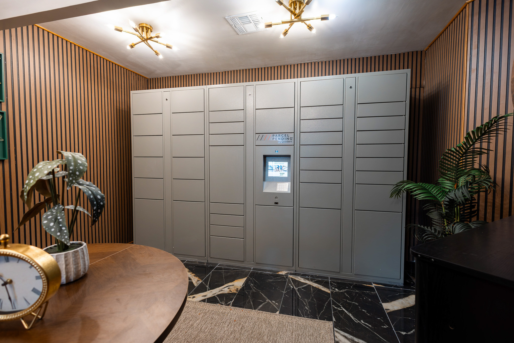 Package locker system for secure resident deliveries at Waterchase Apartments