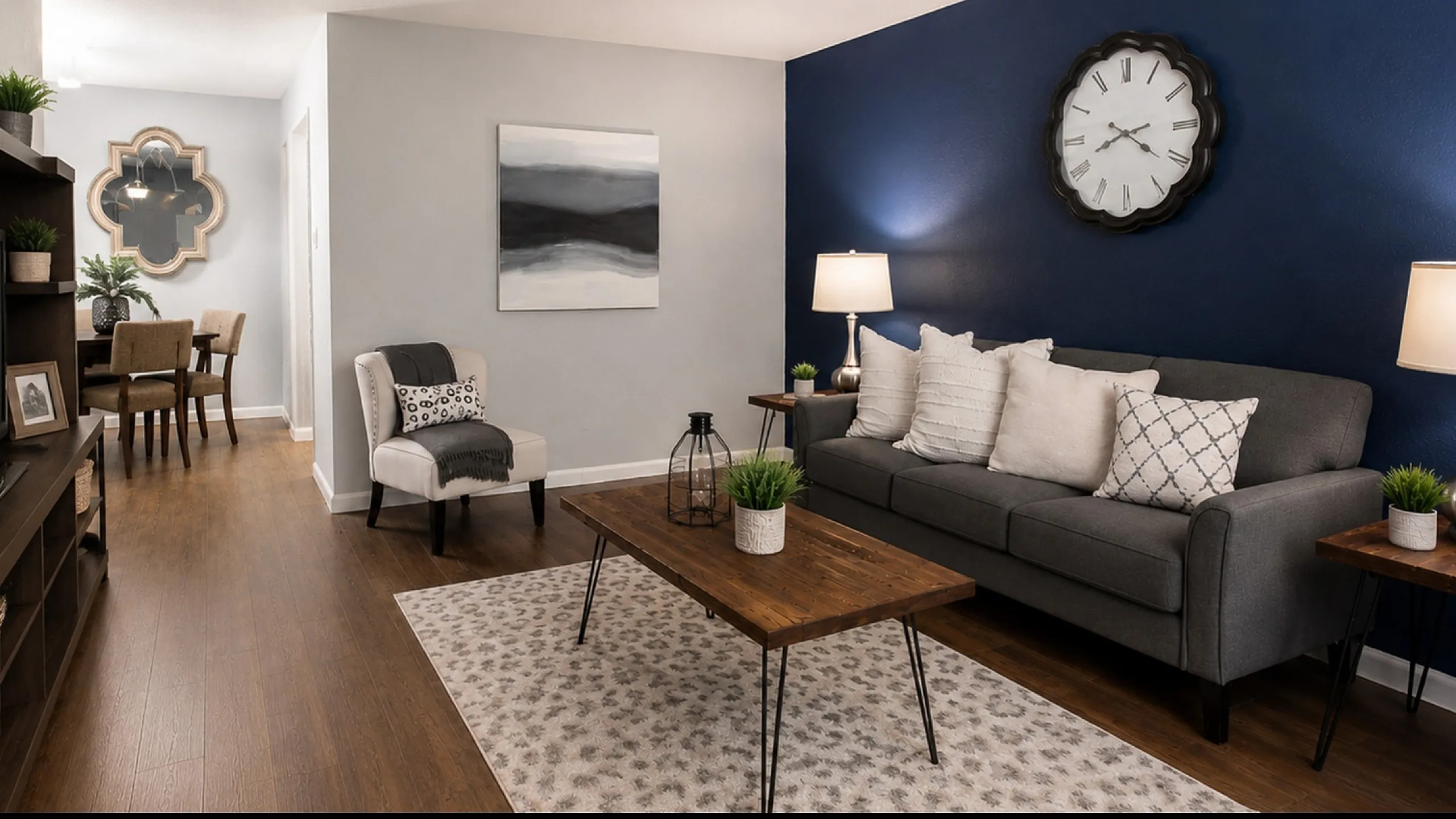 Model apartment living room at Steeplechase Apartments in Alvin, TX