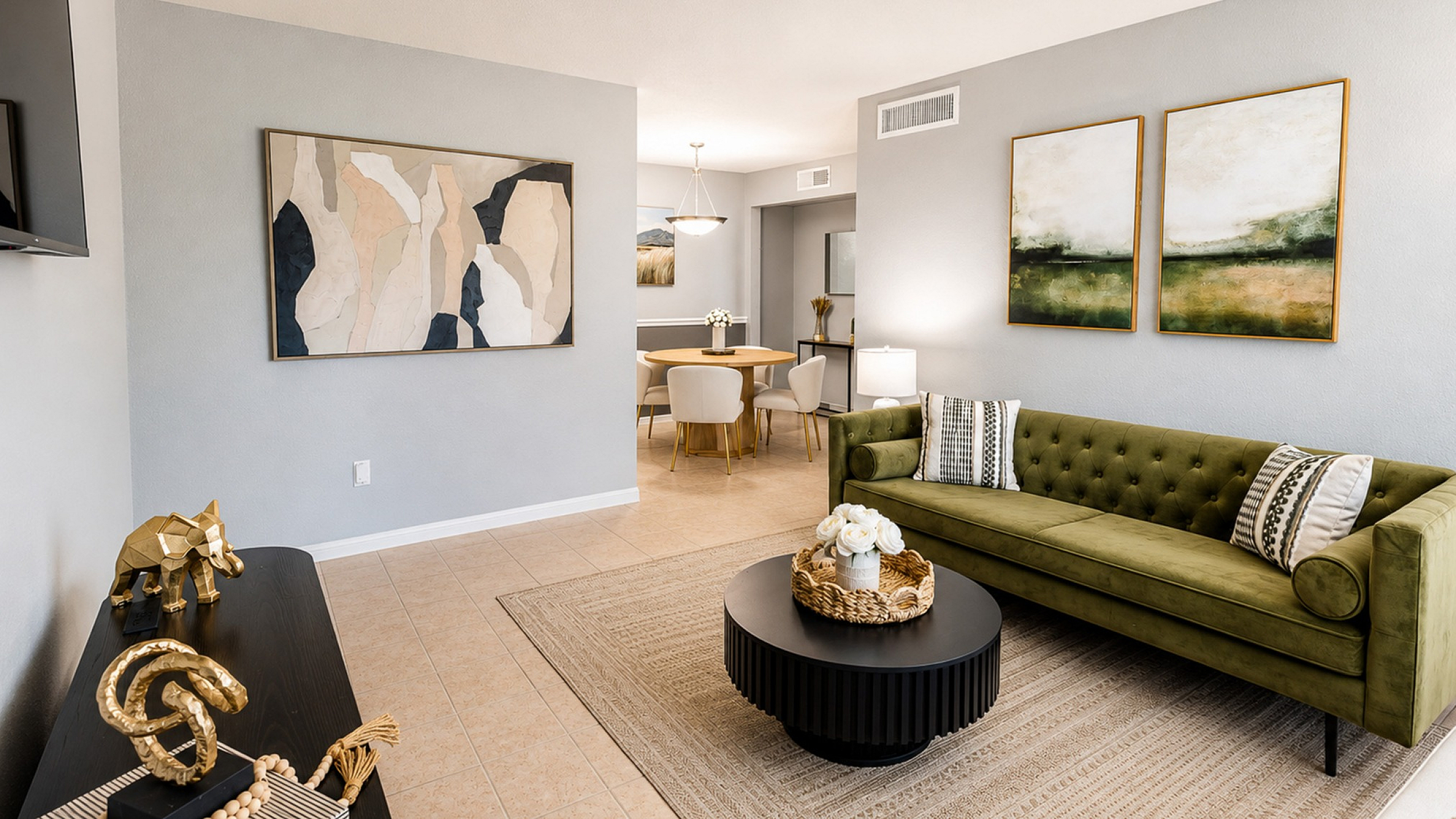 Spacious living room interior at Huntington Oaks Apartments featuring modern furnishings and natural light