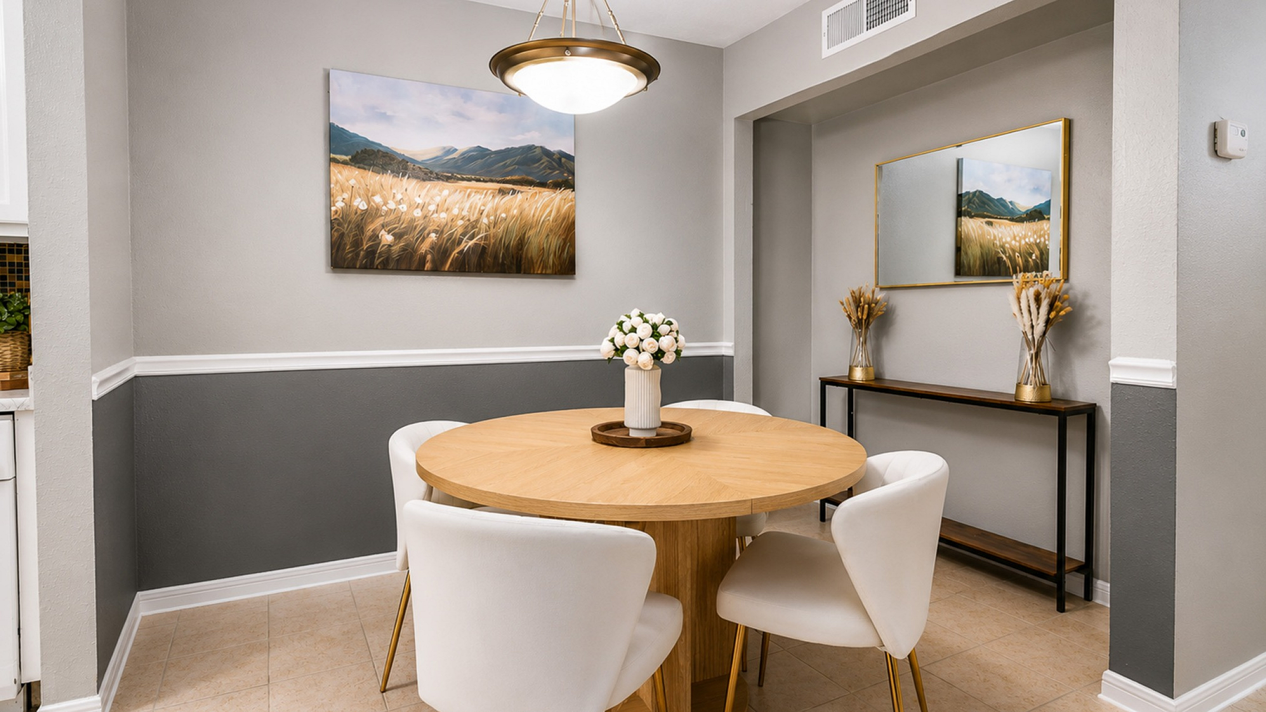 Dining area inside a Huntington Oaks apartment home with modern finishes and open-concept layout