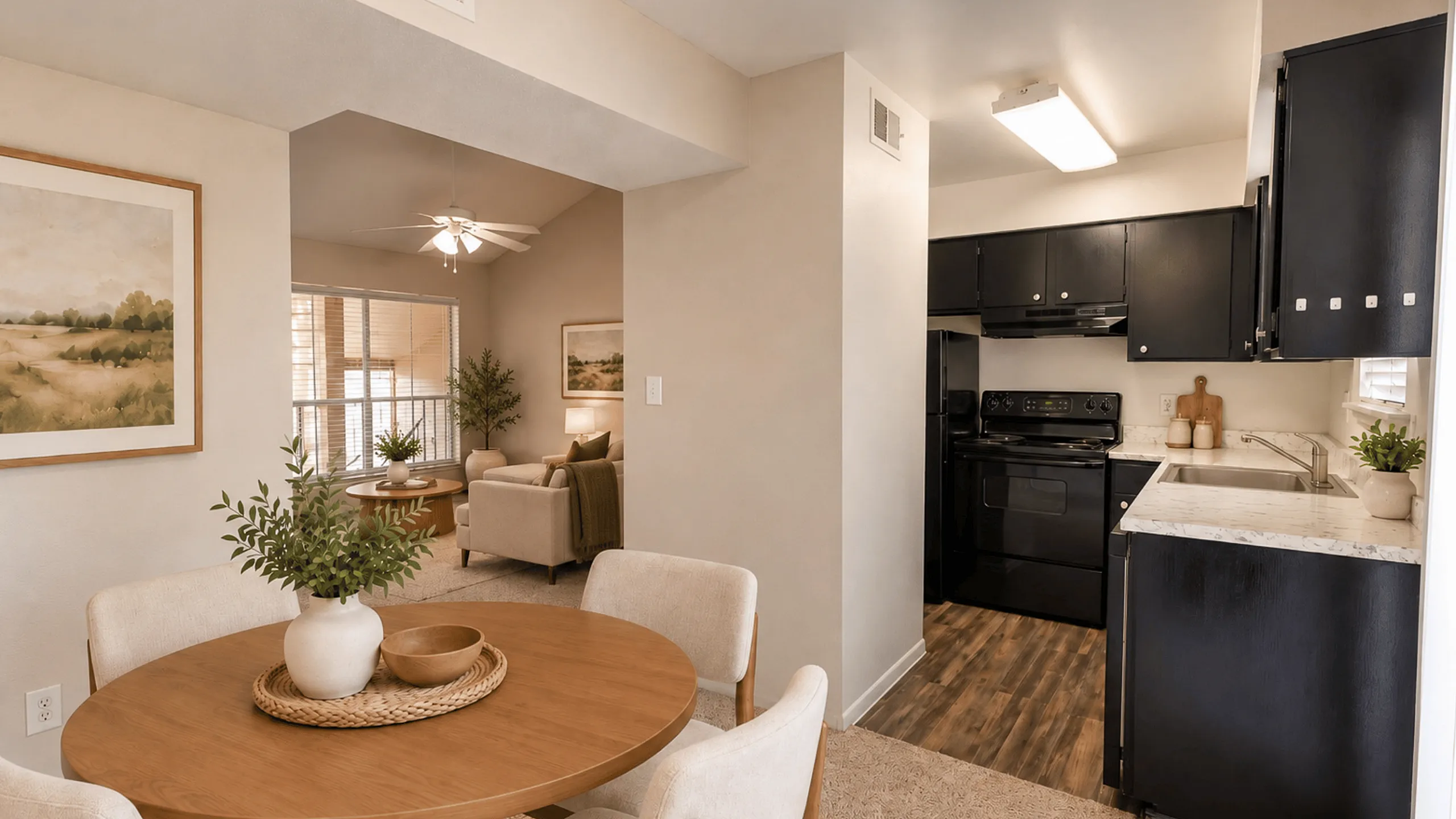 Virtually staged dining area with view into the kitchen and living room at Meadow Park