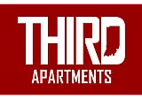 Bold red and white logo for Third Apartments, featuring the silhouette of a state creating a distinctive, stylish brand identity.