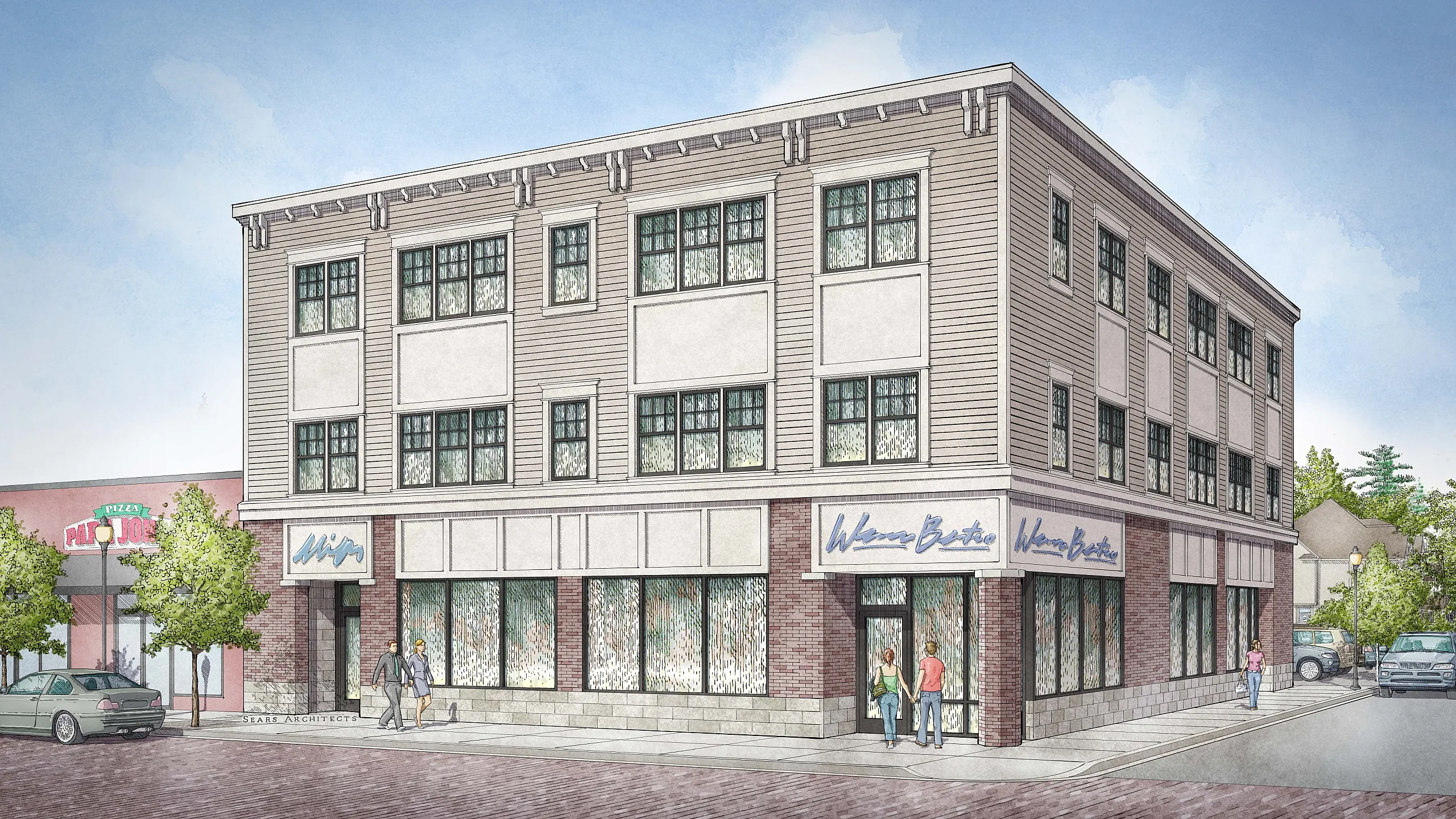 Charming mixed-use building with elegant architecture in Grand Rapids, featuring street-level retail space and stylish upper floor apartments.