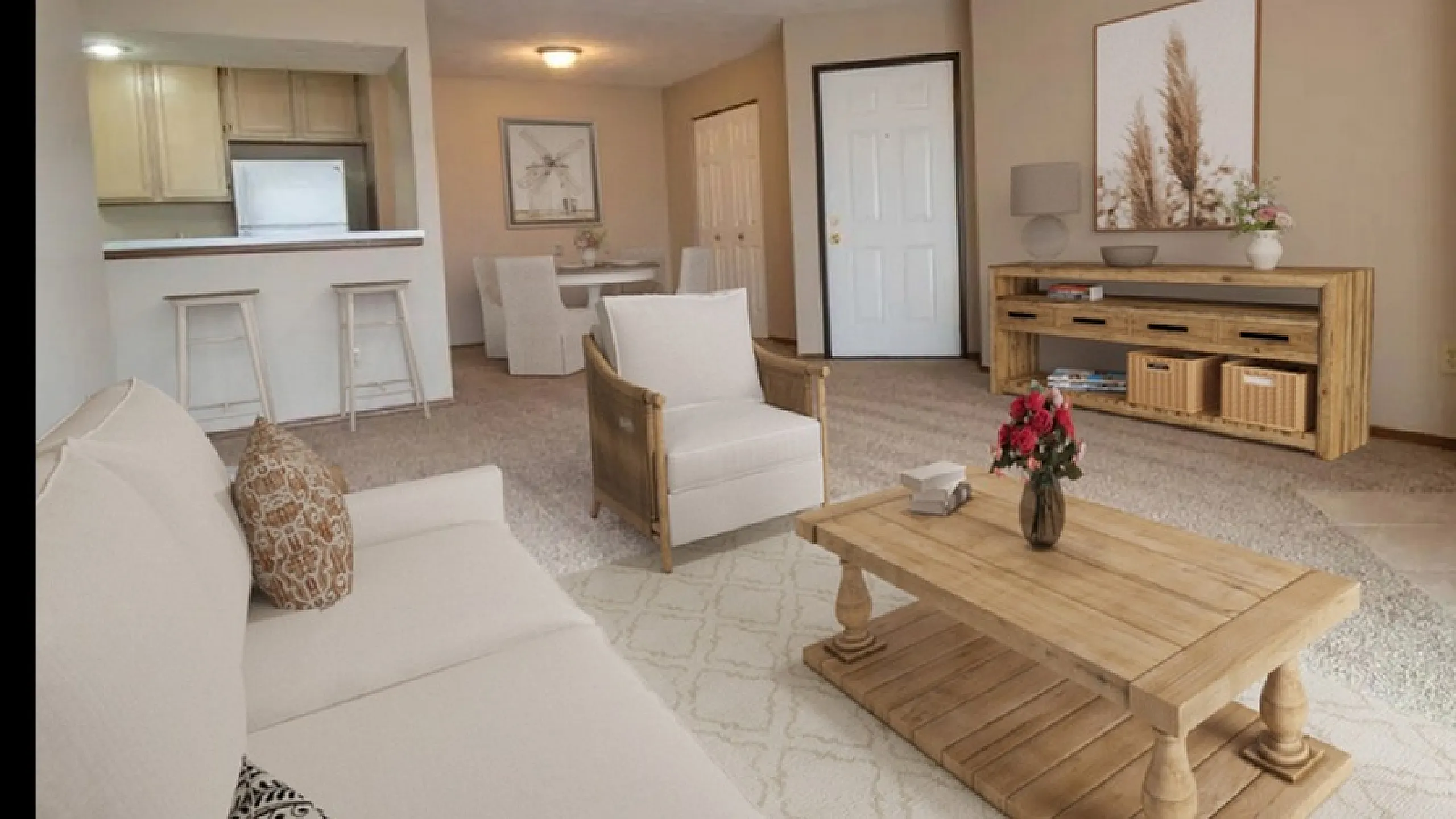 Inviting living room with elegant wooden furniture, plush seating, and a warm, open layout leading to a cozy dining area.