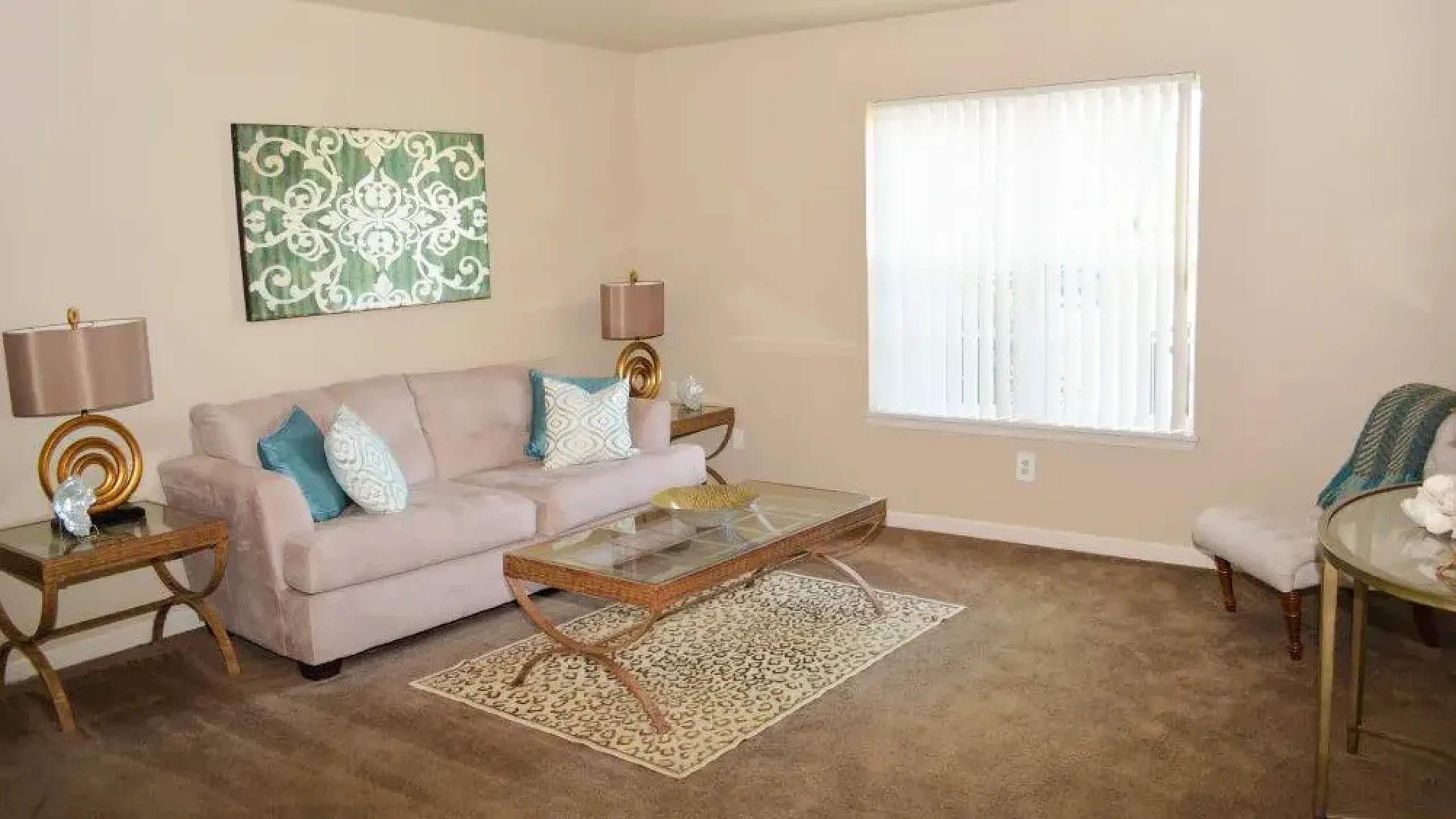 Charming and bright living room with plush seating, modern wooden coffee table, and large windows offering natural light and cozy atmosphere.