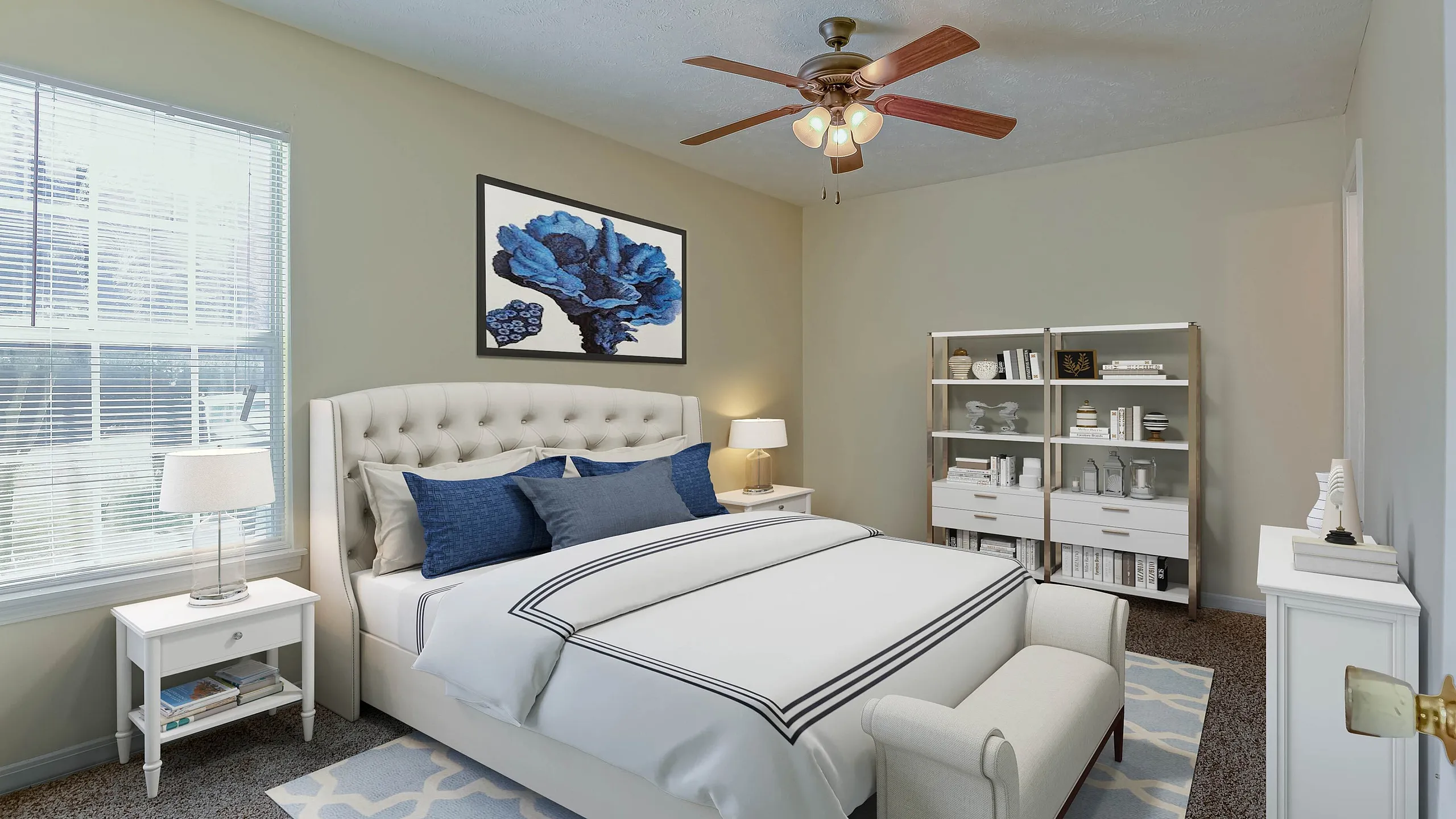 Bright and airy bedroom featuring a plush bed with elegant white and blue bedding, a stylish ceiling fan, and cozy lighting creating a tranquil retreat.